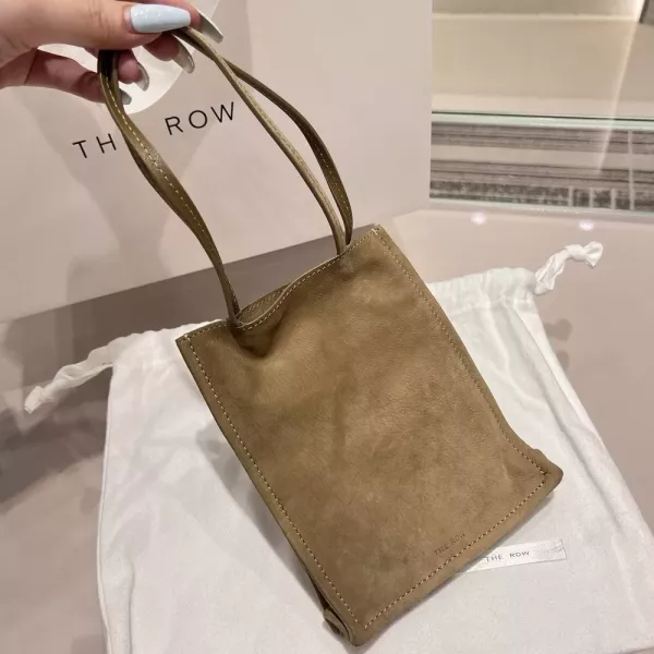더로우 페이퍼백 스타일 스웨이드 핸드캐리 백