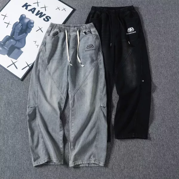 발렌시아가 스터드 디테일 커브드 워싱 데님 팬츠