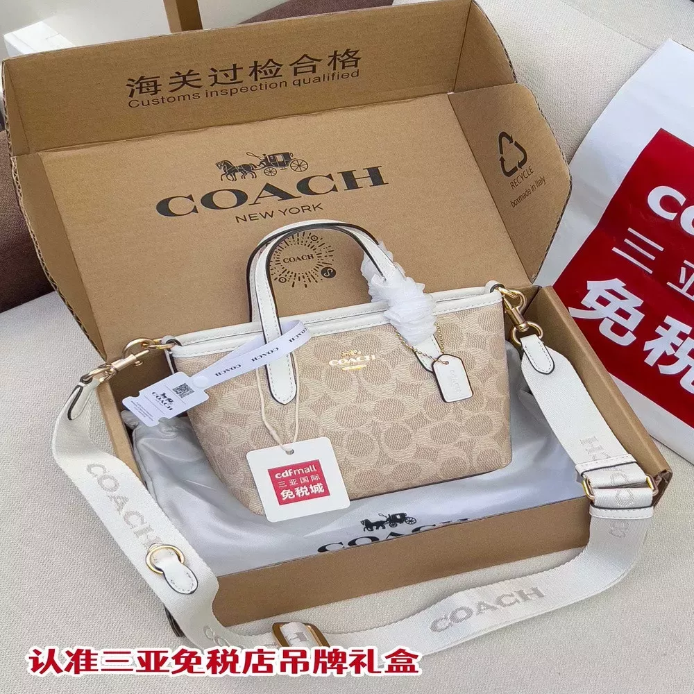 코치 시그니처 미니 시티 토트백