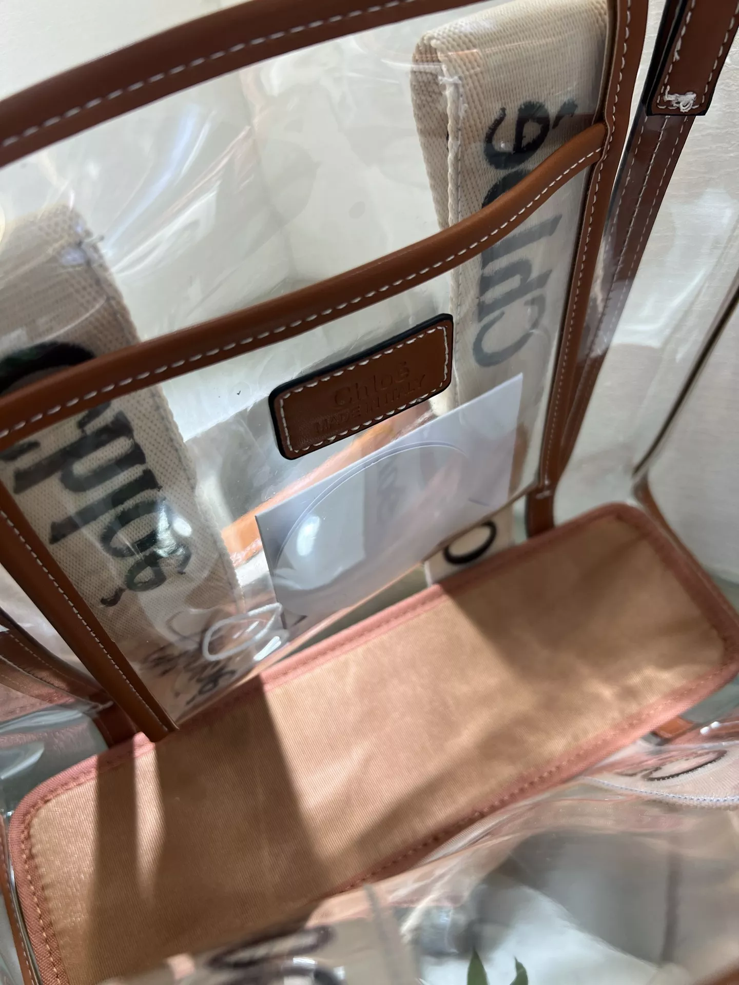 끌로에 우디 로고 스트랩 클리어 토트백 상세 이미지 8