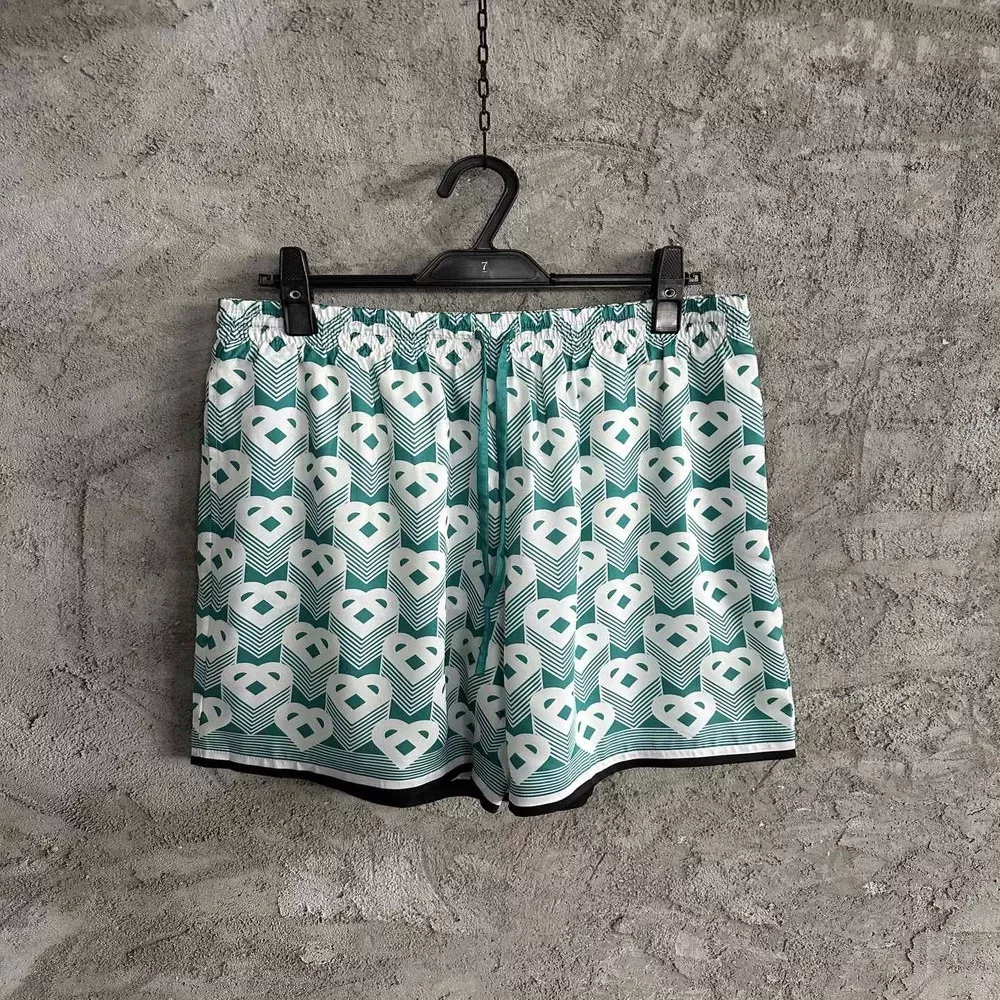 꼼데가르송 그린 하트 패턴 실크 쇼츠