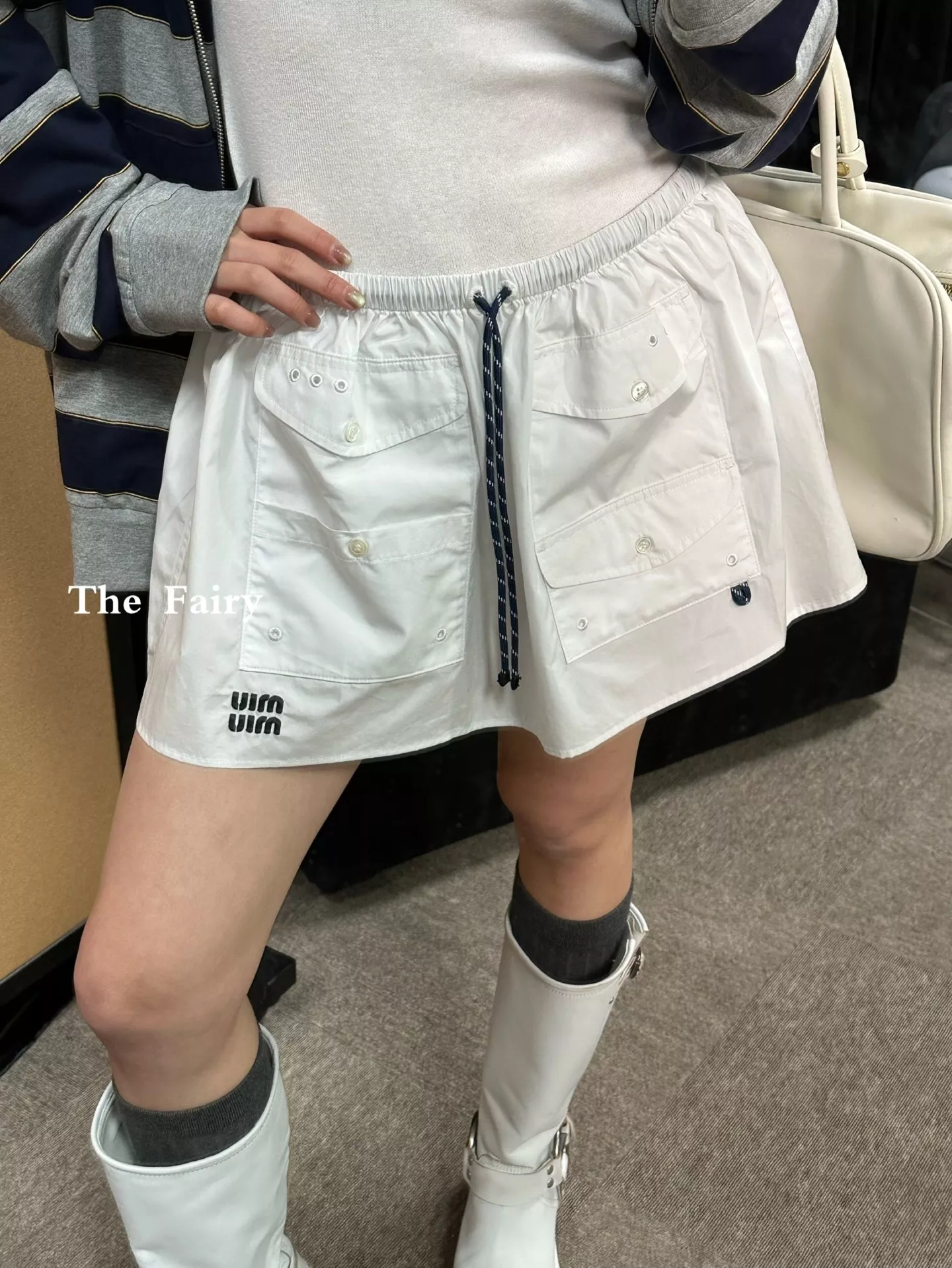 미우미우 로고 자수 코튼 공방 미니 스커트 상세 이미지 17