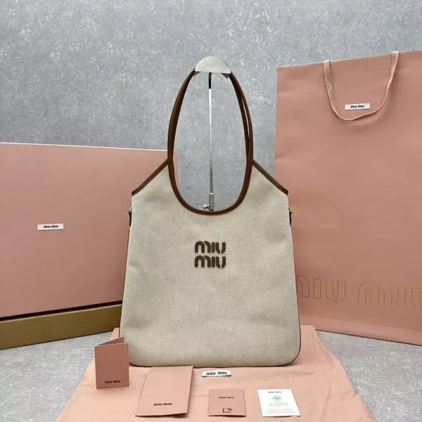 미우미우 캔버스 로고 숄더 백