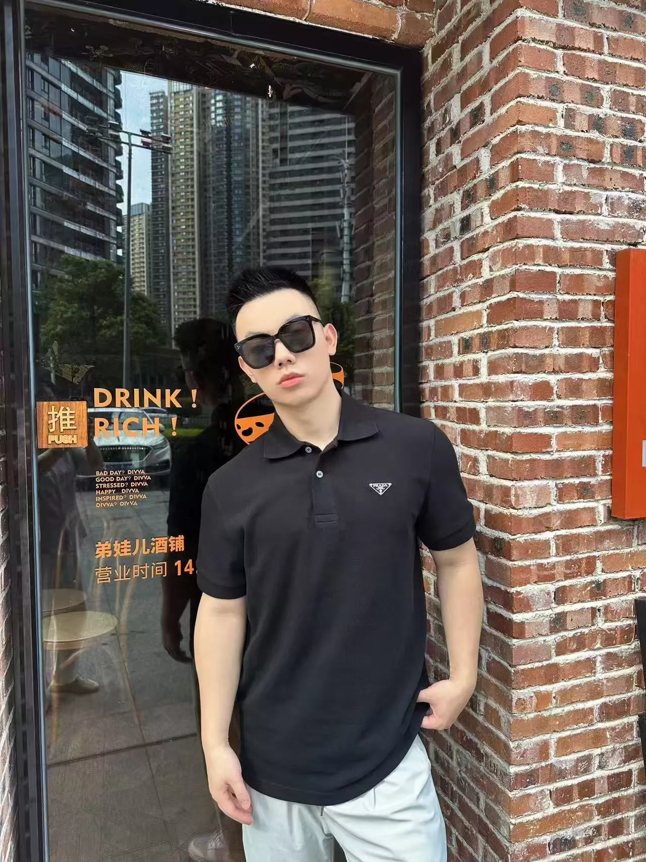 프라다 메탈 삼각 로고 코튼 폴로 반소매 상세 이미지 24
