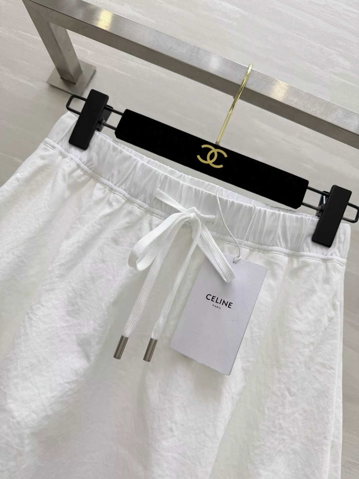셀린느 미니멀 A라인 밴딩 스커트 상세 이미지 5