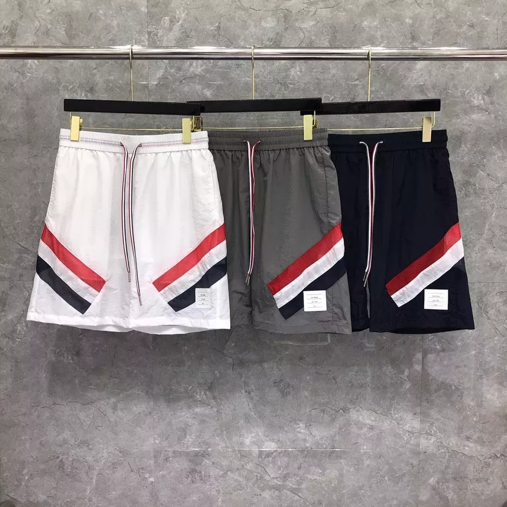 톰브라운 클래식 배색 메쉬 비치 팬츠