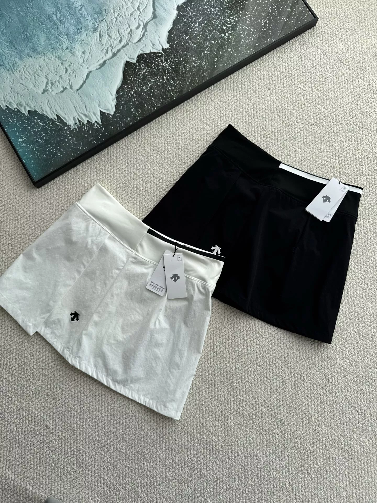 데상트 여성 트레이닝 언밸런스 치마바지 상세 이미지 12