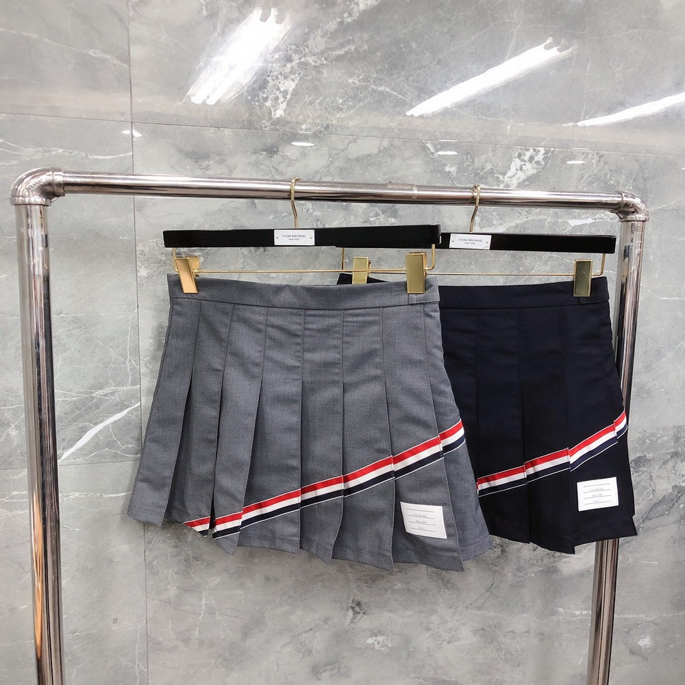 톰브라운 사선 배색 플리츠 스커트