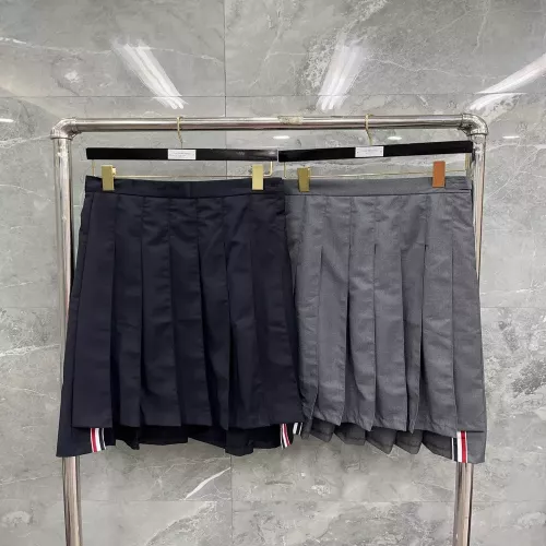 톰브라운 사선 포인트 플리츠 스커트