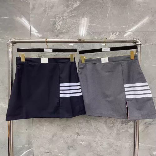 톰브라운 사선 포인트 A라인 스커트