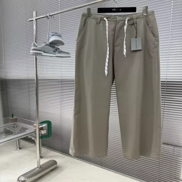 발렌시아가 사선 면 버튼 포켓 캐주얼 팬츠
