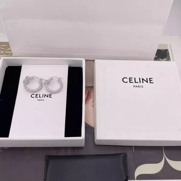 셀린느 매듭 장식 큐빅 이어링