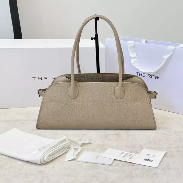 더로우 롱 숄더 스트랩이 돋보이는 백