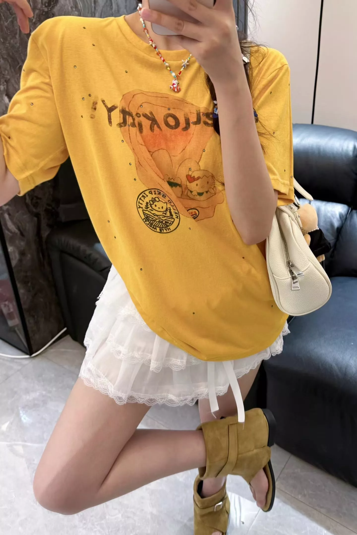 노브랜드 빈티지 키티 프린팅 반팔 탑 상세 이미지 15