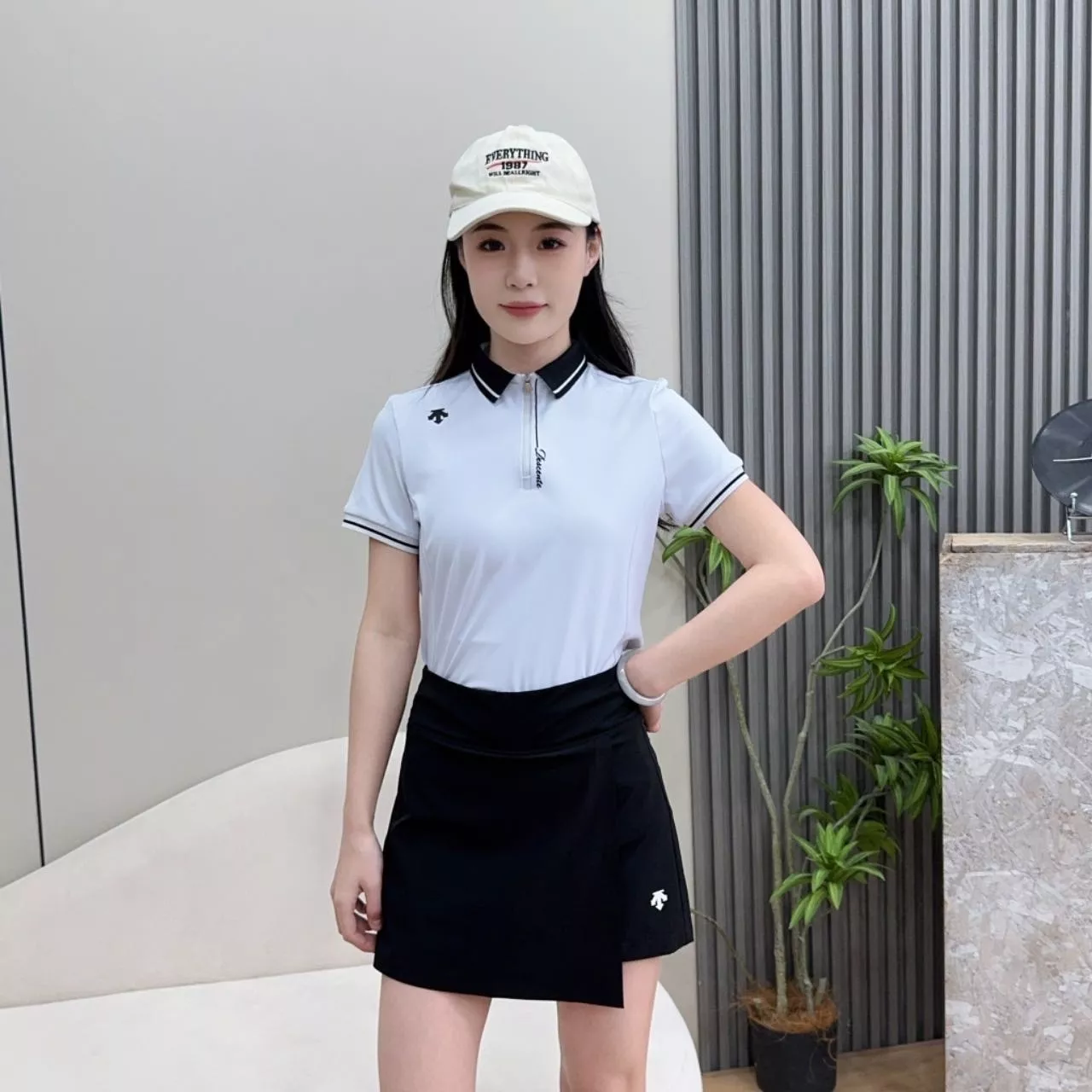 데상트 여성 반집업 폴로 상의 상세 이미지 11