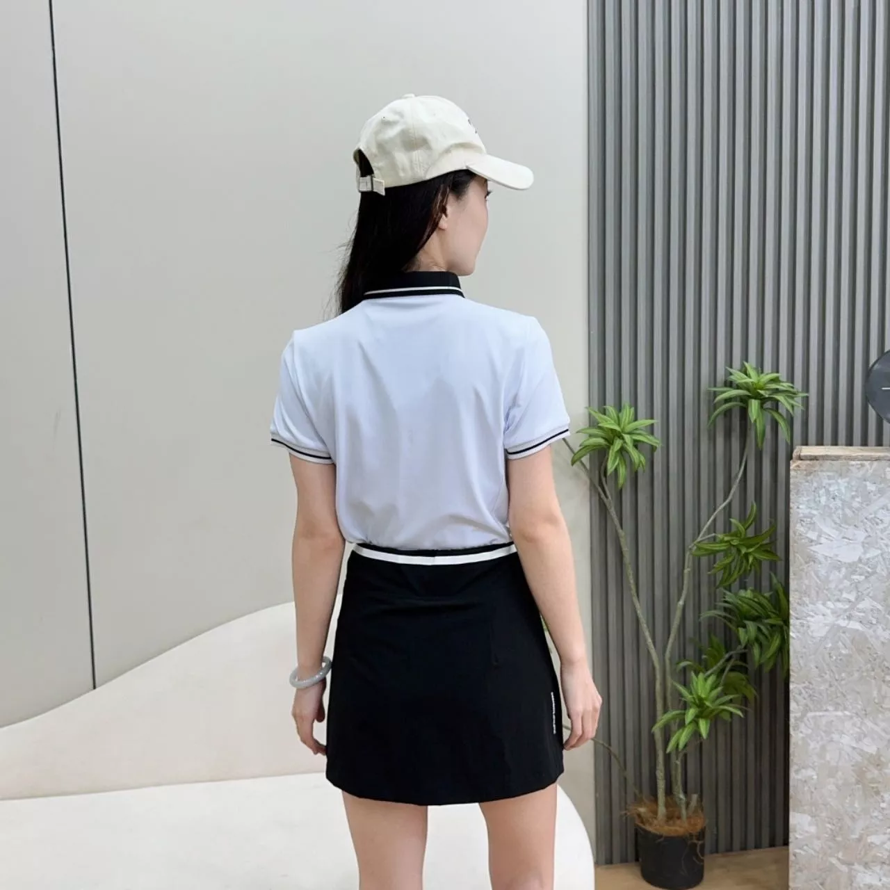 데상트 여성 반집업 폴로 상의 상세 이미지 14