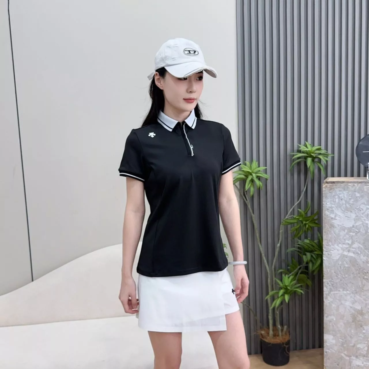데상트 여성 반집업 폴로 상의 상세 이미지 10