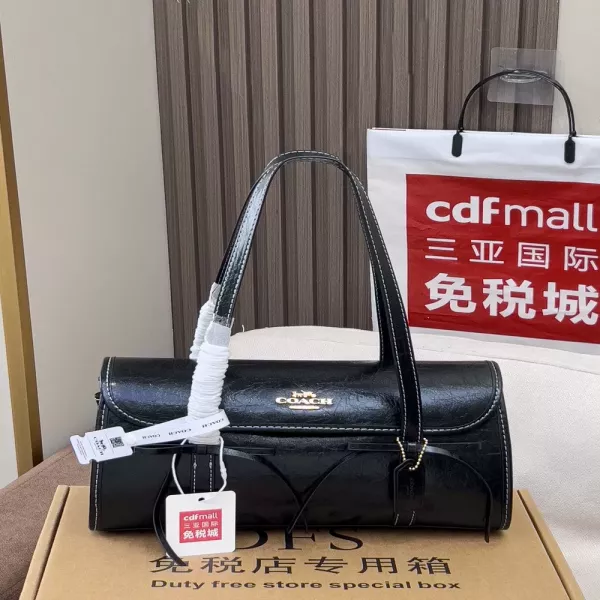 코치 리본 장식 플랩 숄더 가방