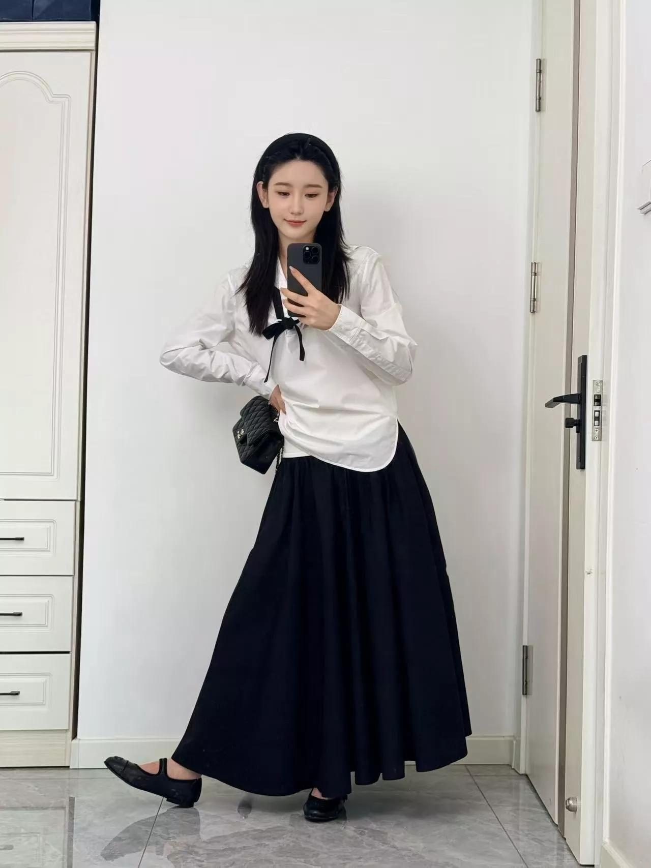랄프로렌 블랙앤화이트 배색 플리츠 스커트 상세 이미지 33