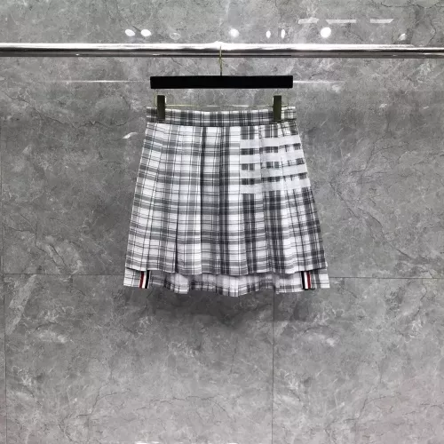 톰브라운 체크 플리츠 스커트