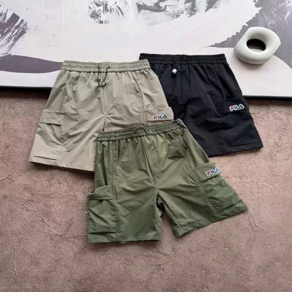 휠라 속건 우븐 하프 팬츠