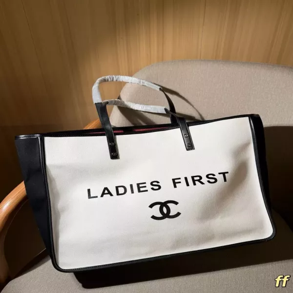 샤넬 블랙 화이트 배색 캔버스 쇼핑백