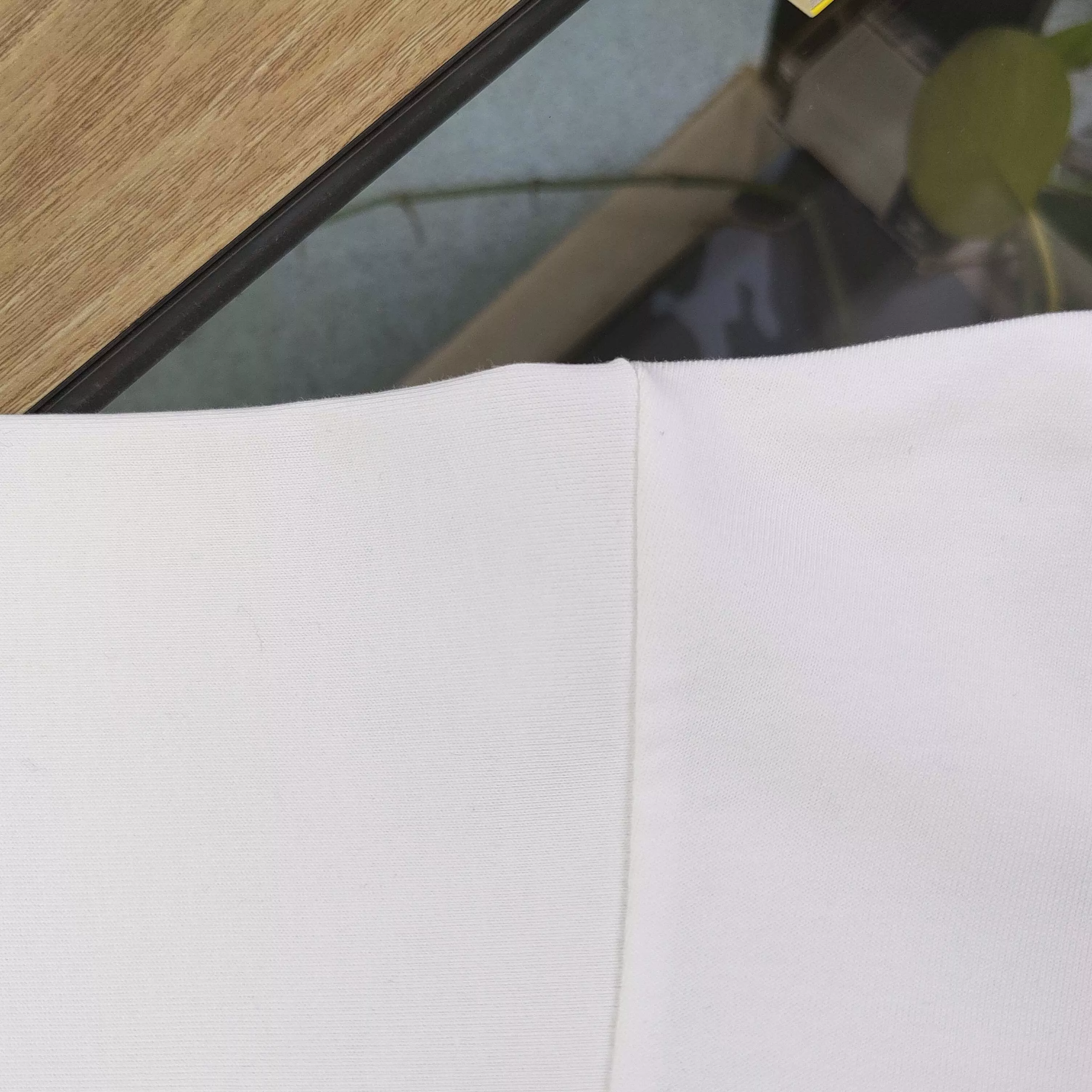프라다 삼각 스테인리스 로고 오버핏 반소매 티셔츠 상세 이미지 8