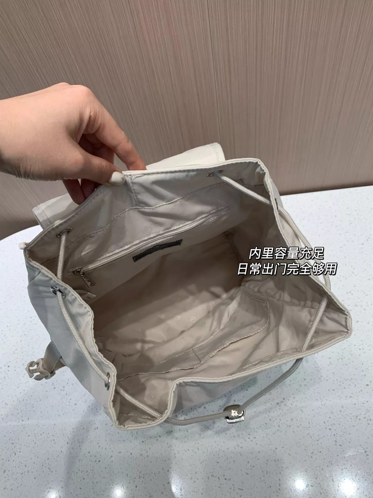 휠라 나일론 워싱 플랩 드로스트링 여성 백팩 상세 이미지 25