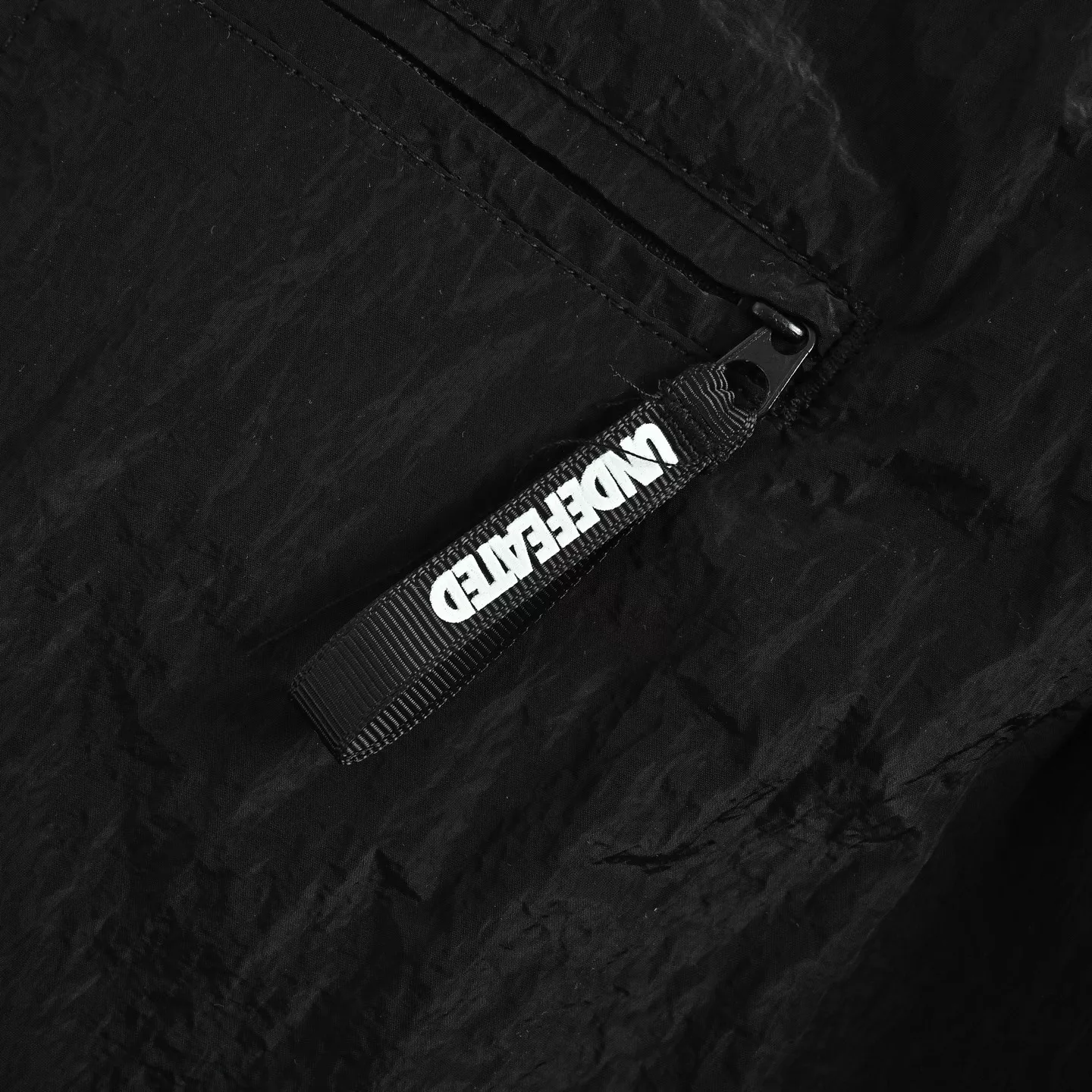언디피티드 파이브 스트라이프 로고 방수 우븐 하프 팬츠 상세 이미지 8