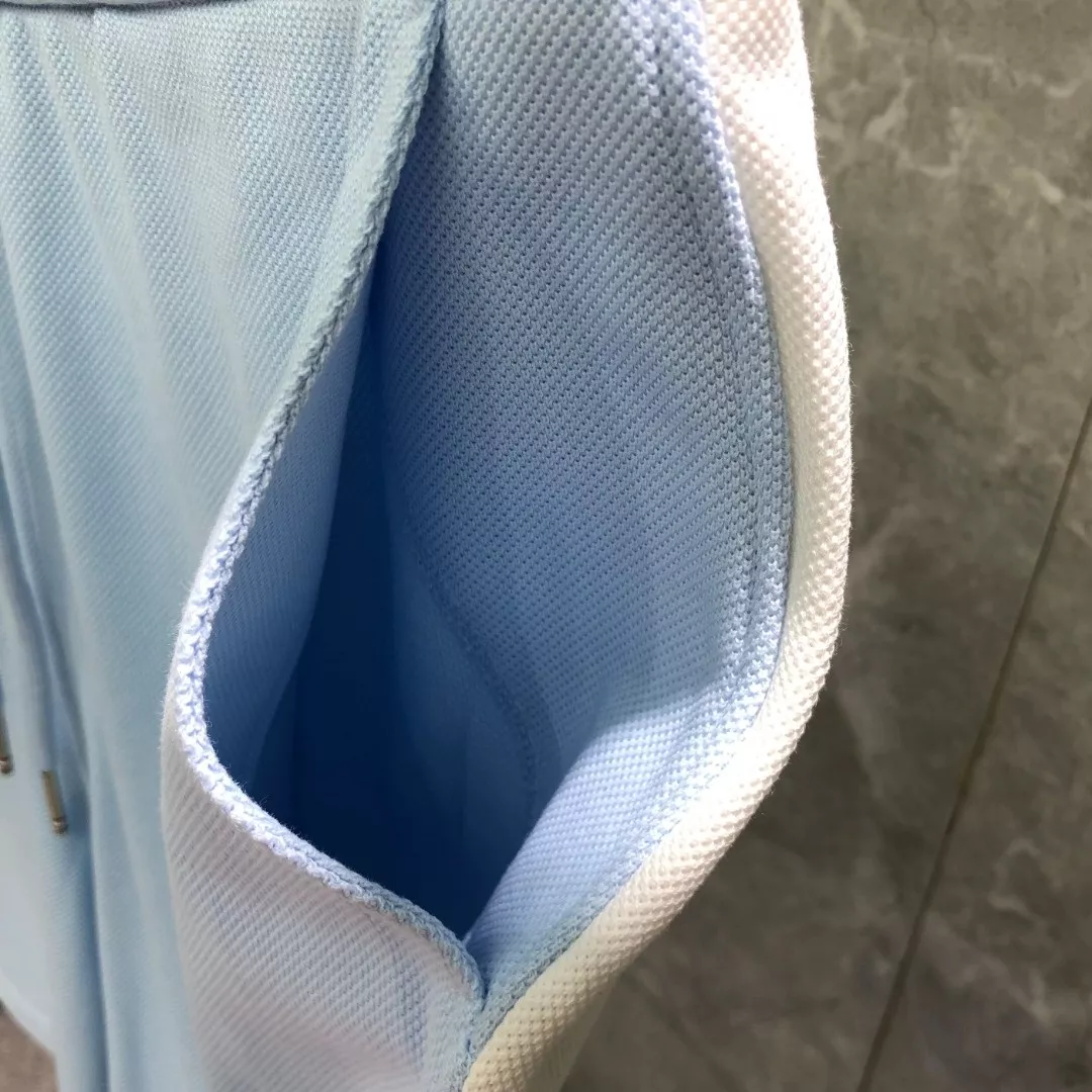 톰브라운 배색 패널 드로스트링 피케 하프 팬츠 상세 이미지 8