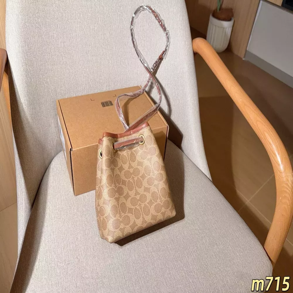 코치 제이드 로고 패턴 미니 버킷백