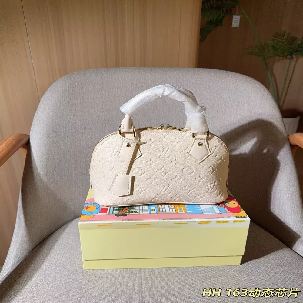 루이비통 알마 트렁크 엠보 베이지 쉘 토트백
