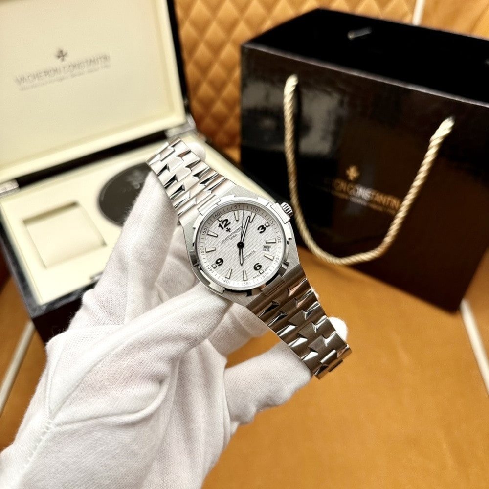 반클리프아펠 오버시즈 42mm 화이트 다이얼 오토매틱 메탈 시계
