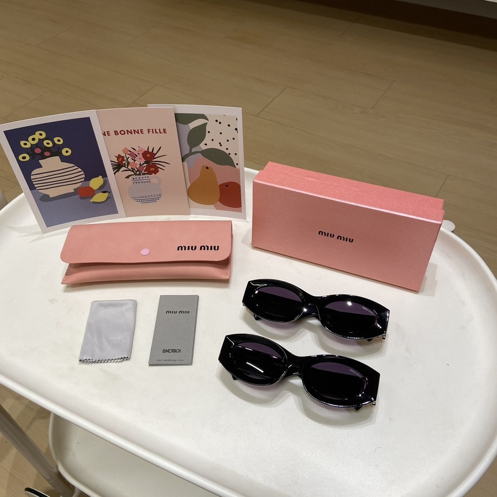 미우미우 오벌 아세테이트 편광 선글라스