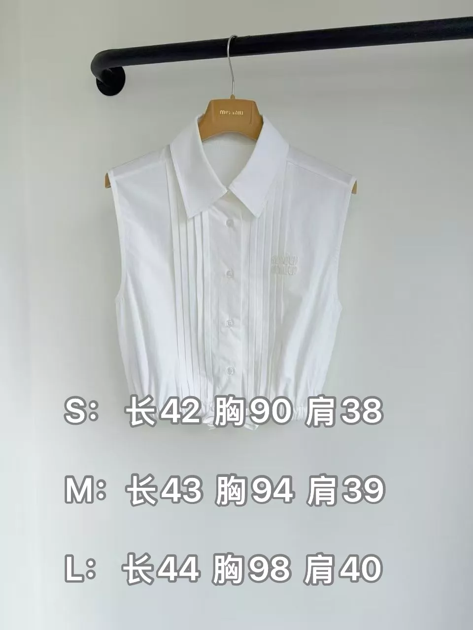 미우미우 코튼 포플린 새틴 칼라 민소매 셔츠 상세 이미지 10