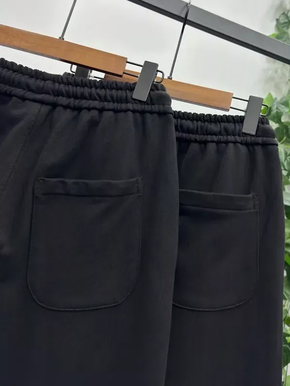 오프화이트 자수 프린트 와이드 남녀공용 트레이닝 팬츠 상세 이미지 6