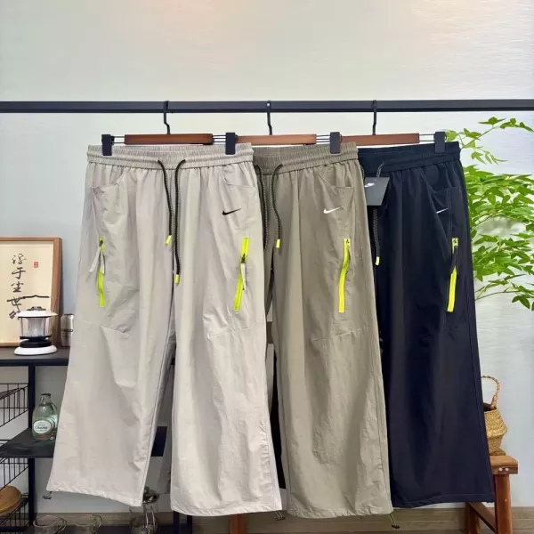 나이키 방수 지퍼 투웨이 남녀공용 트레이닝 팬츠