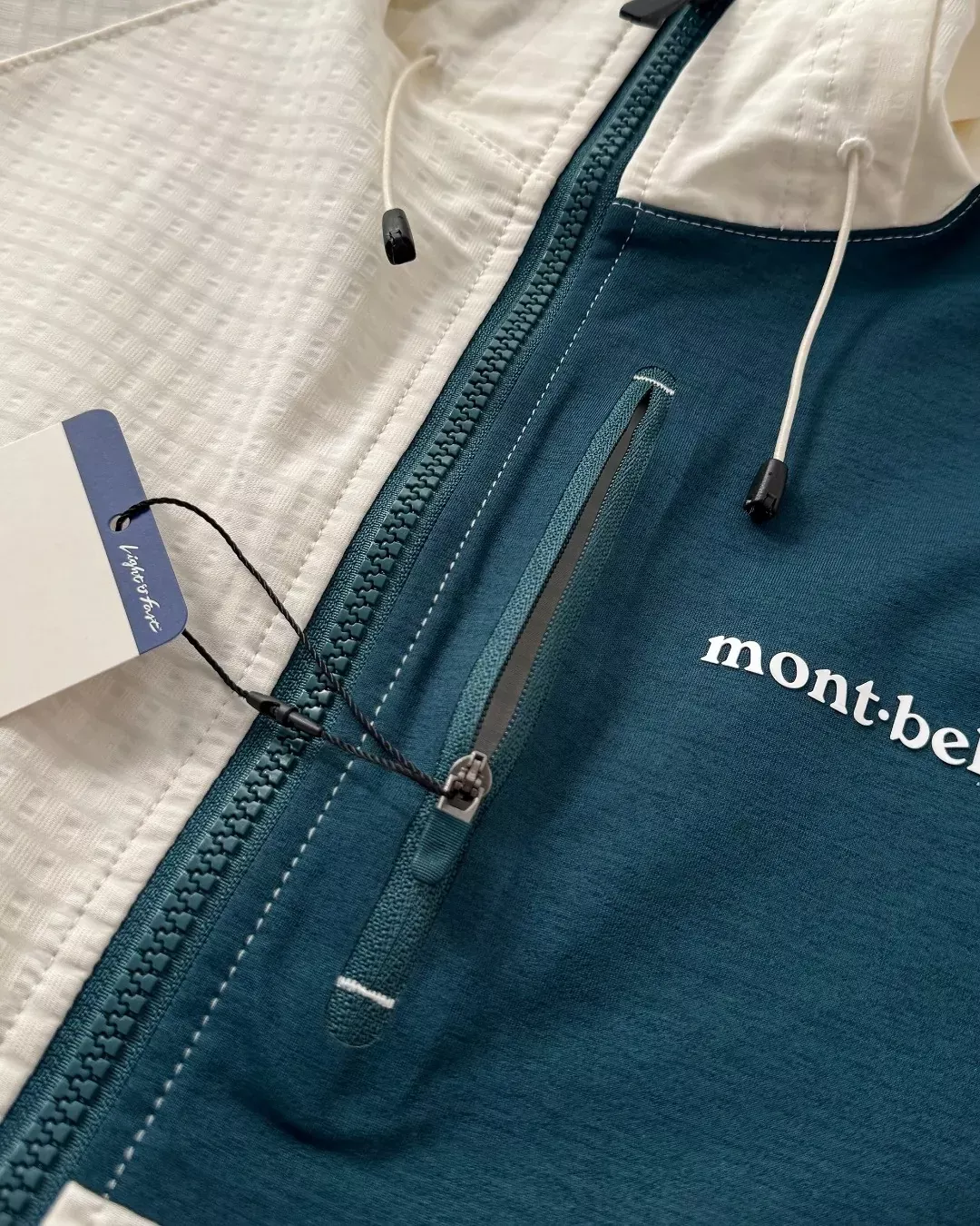 몽벨 경량 체크 배색 남녀공용 후드 재킷 상세 이미지 22