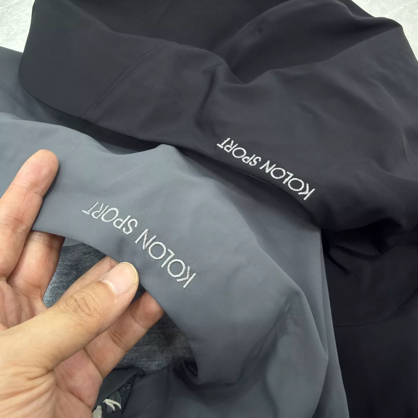 코오롱스포츠 스탠드넥 소프트셸 남녀공용 후드 재킷 상세 이미지 8